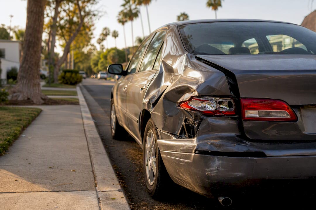 Close-up of damaged car bumper after accident